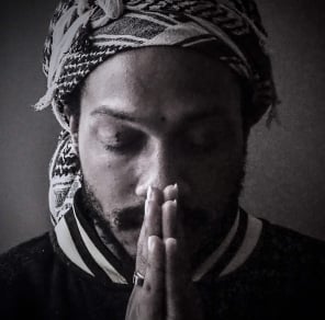 up close image of a man praying