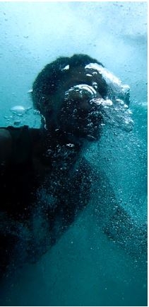 photograph of a person in water 