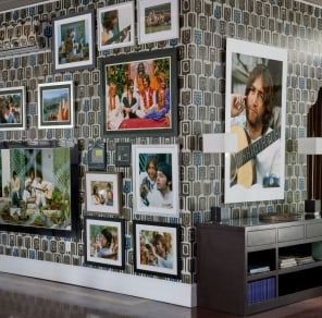 photographs of the Beatles on a wall