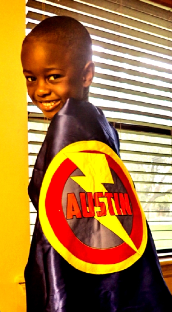 child dressed as a super hero