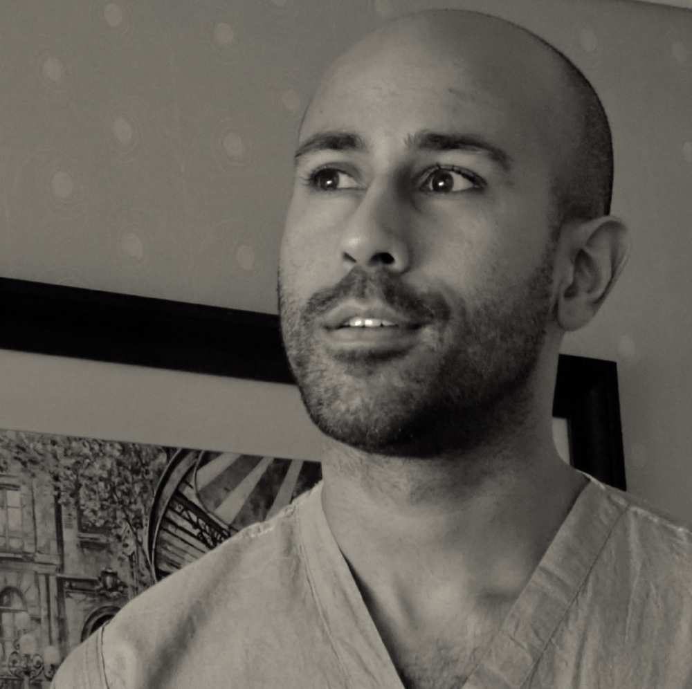 b/w photo of a male nurse