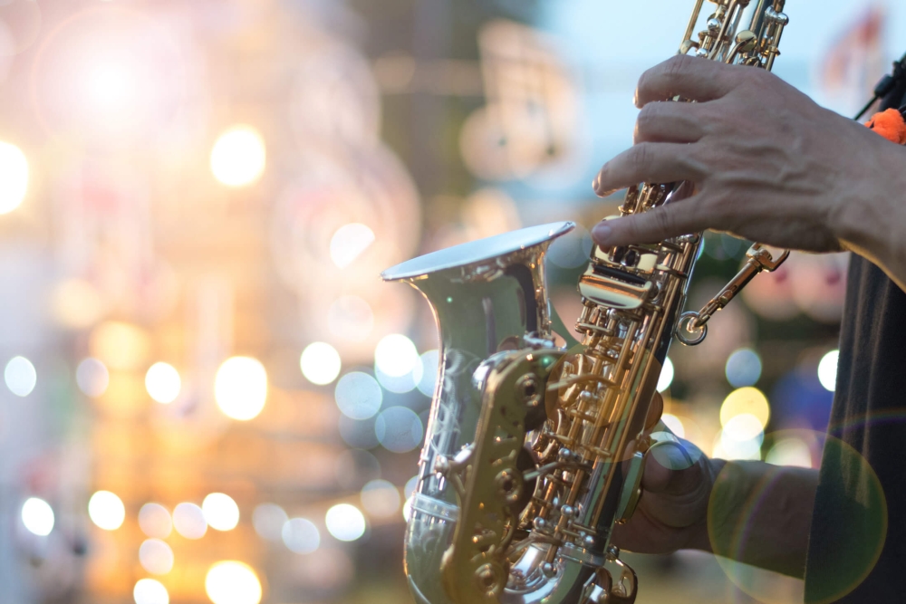 personplaying sax