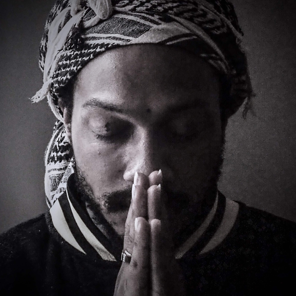 up close image of a man praying