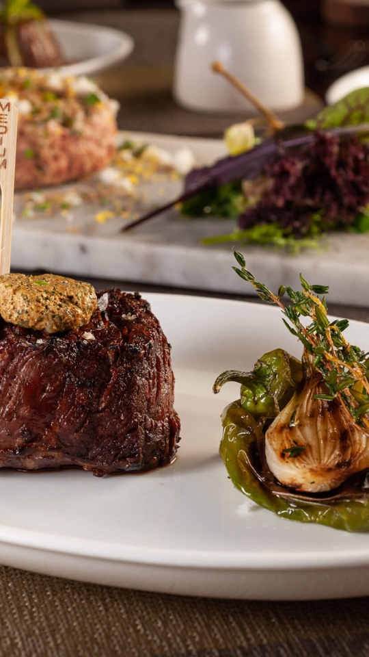 Steak with peppers, garlic, and thyme