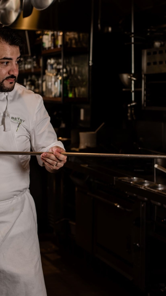 chef using pizza oven