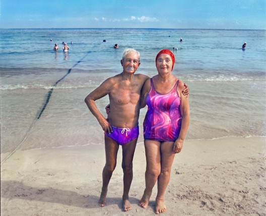 two people wearing similar bathing suits