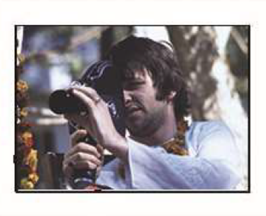 george with a camera