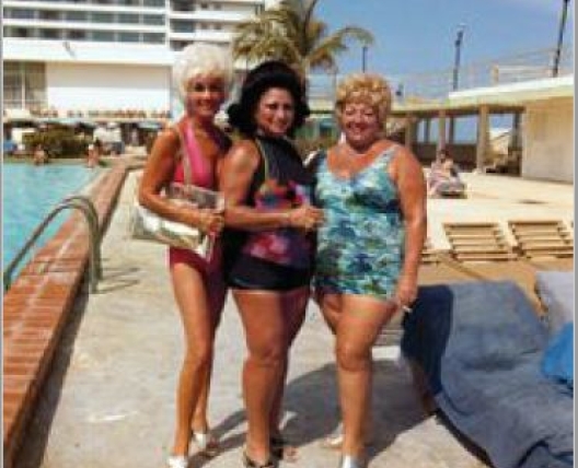 three woman standing in swimwear 